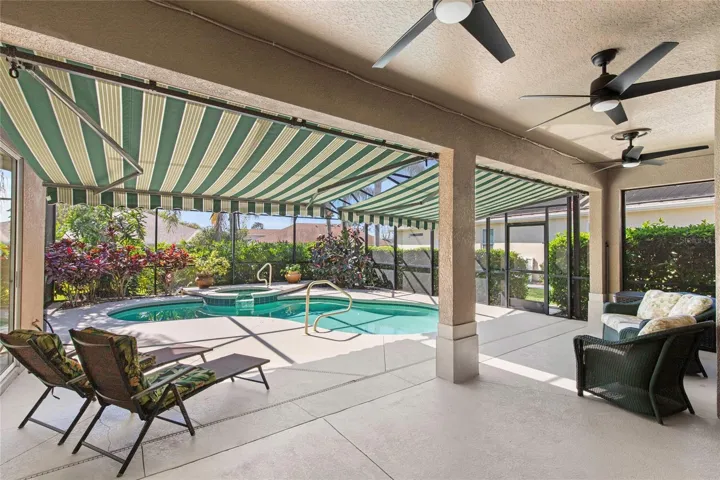 Notice Electronic Shade extended over Lanai Pool Area