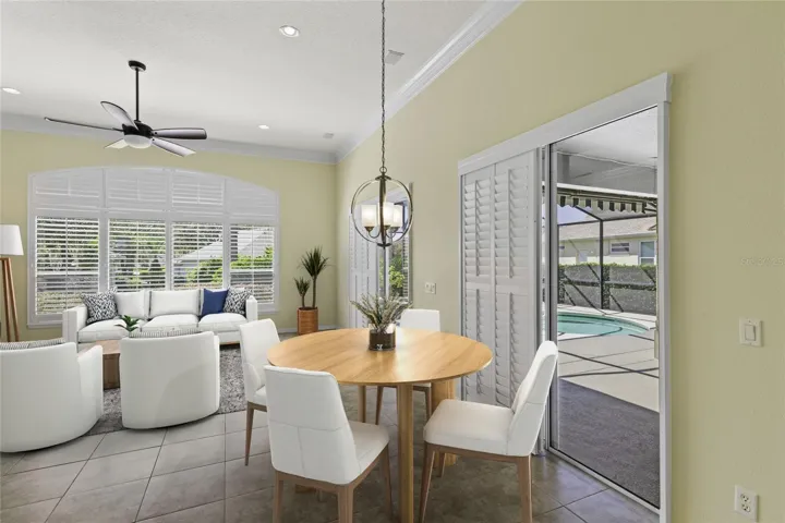 Family Room with Eat In Area with Plantatioin Shutters