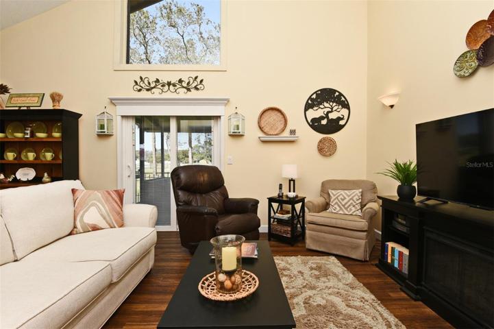 Living Great Room-Large Windows-Vaulted Ceilings-Hurricane Sliding Glass Doors