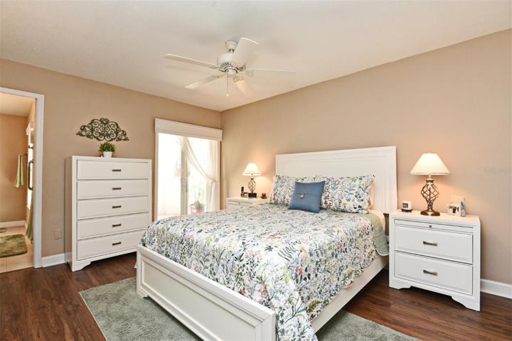 Primary Bedroom w/ Sliding Door Access To Private Outdoor Atrium