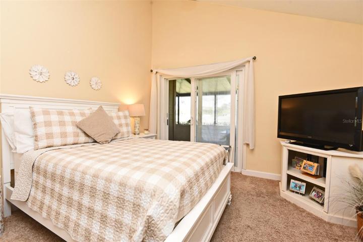 Bedroom 2 With Sliding Glass Door Access To Screened Porch