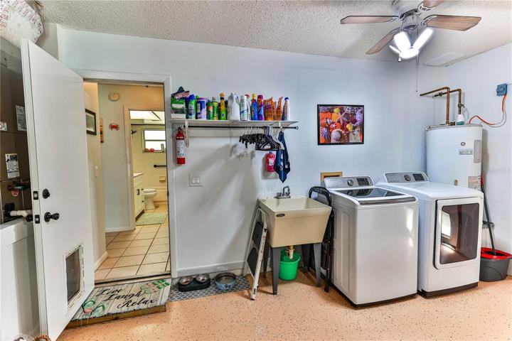 Inside laundry, laundry tub, H/W tank 2010, washer, dryer