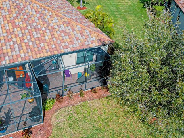 Mature landscaping provides privacy to the lanai.