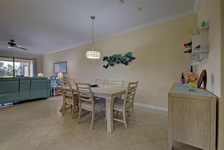 The dining room can easily accommodate a table for six or eight people.