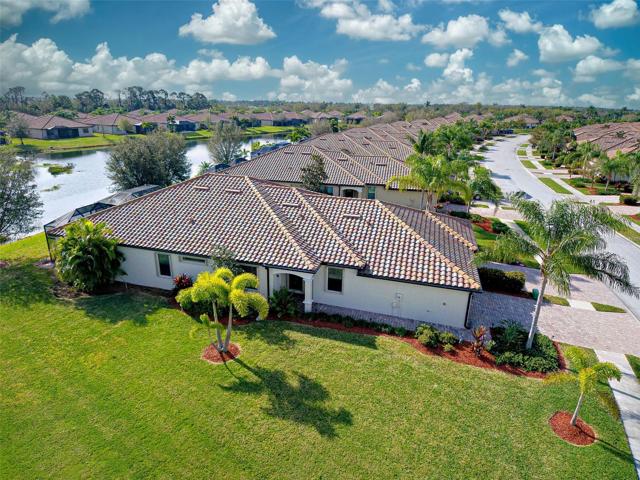Wonderful drone technology allows views of the home and neighborhood.  What a great place to live!