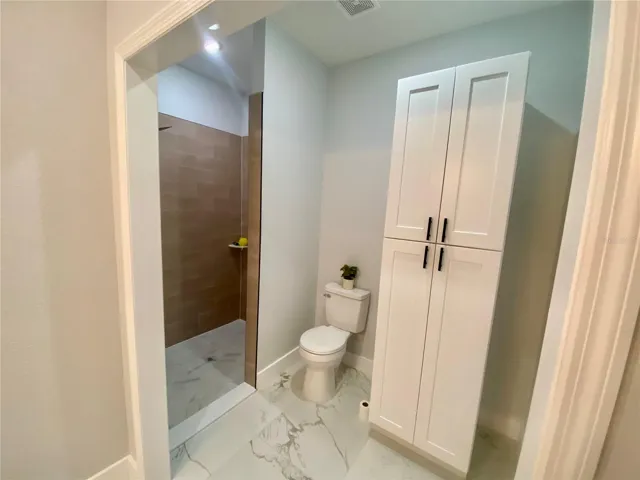 primary bath storage cabinet