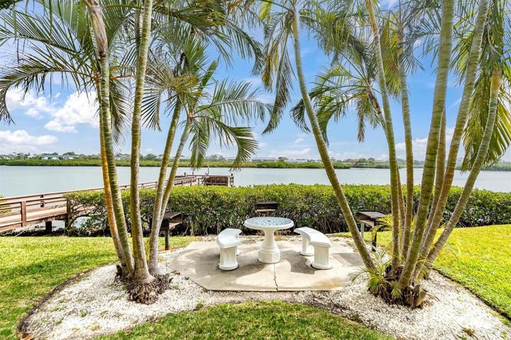 Outdoor grilling area with seating and beautiful views.