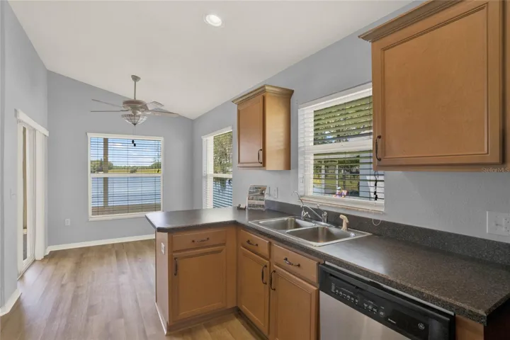 Pecan Cabinetry with Crown Molding Trim