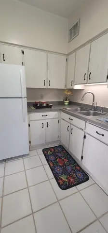 Pot-filler faucet and tall ceilings.