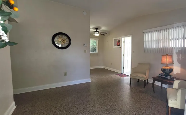 Come on in! Your Living Room with views to the Dinette and Kitchen. Terrazzo floors thru-out - NO CARPET!