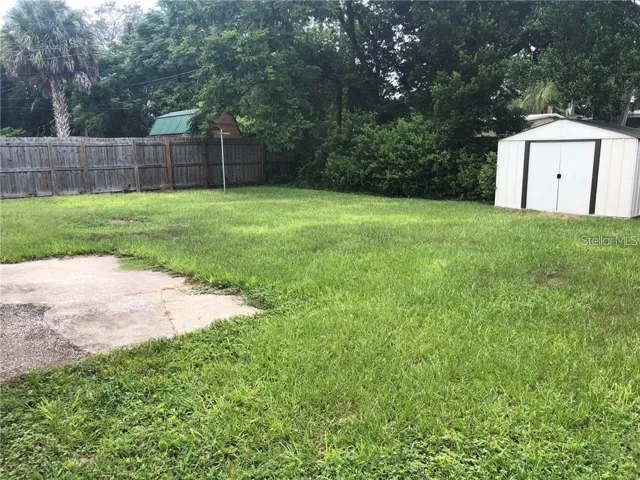 Big privacy fenced backyard and storage shed