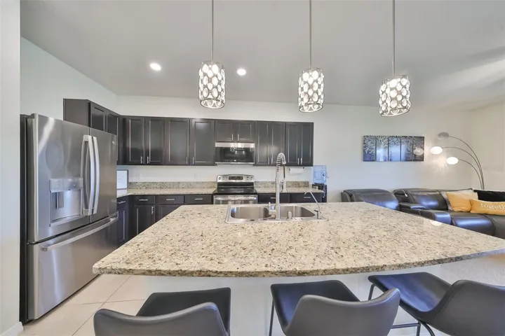 All NEW appliances and contemporary granite makes this sparkling clean kitchen ready for maximum enjoyment.