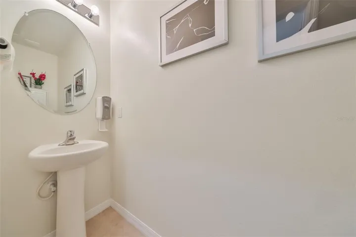 Modern 1/2 bath  on the ground floor for guests.