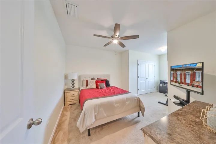 Bedroom 2 has NEW carpet with ceiling fan and lighting and double door closet.