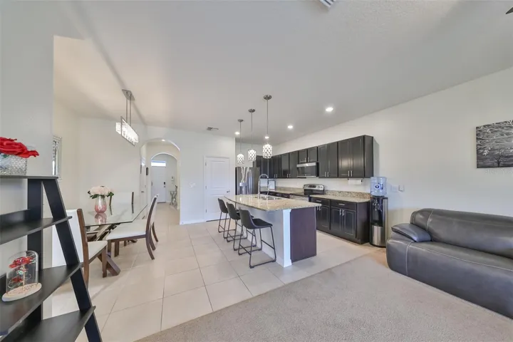 High Ceilings, soft contemporary paint tones (freshly painted) give a wonderful relaxing feeling to this home.