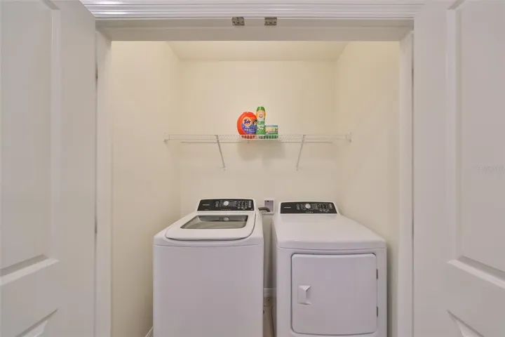 Laundry room is conveniently upstairs.