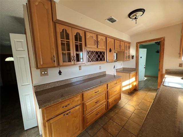 Galley Kitchen with Laminate Counters