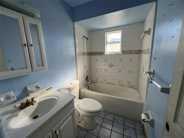 Hall Bathroom with Tile Wainscot