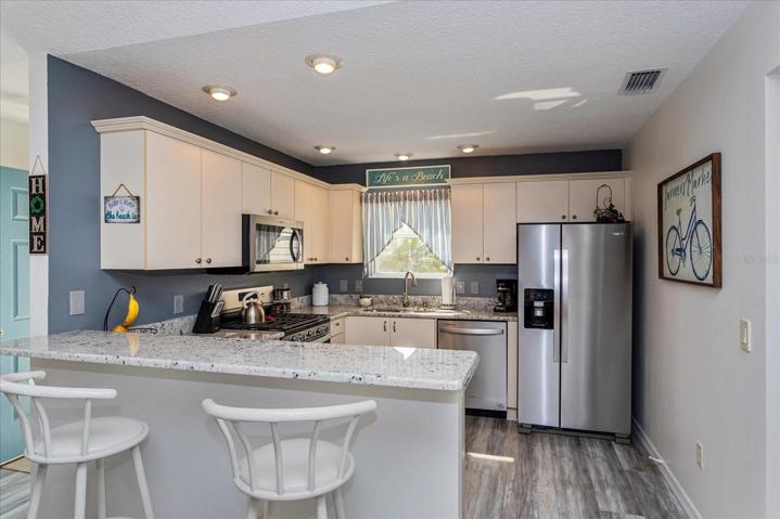 Eat-In Kitchen Bar, Great for Morning Coffee,  New Granite Countertops & New SS Appliances