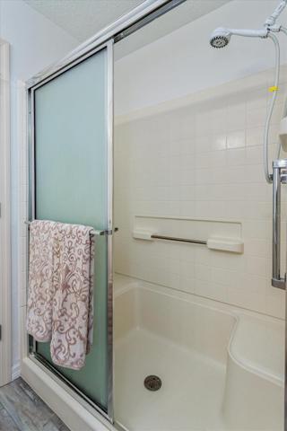 Walk-In Shower w/Bench Seat in Master Bedroom