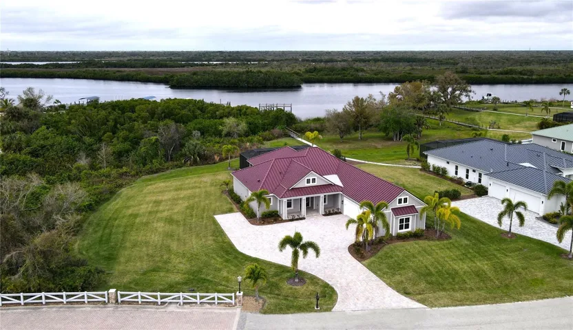 Aerial view of home with Peace River in background