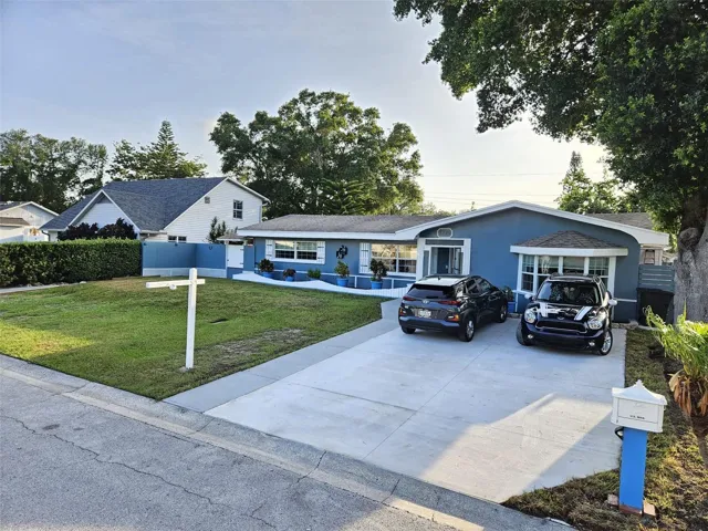 Front with brand-new driveway