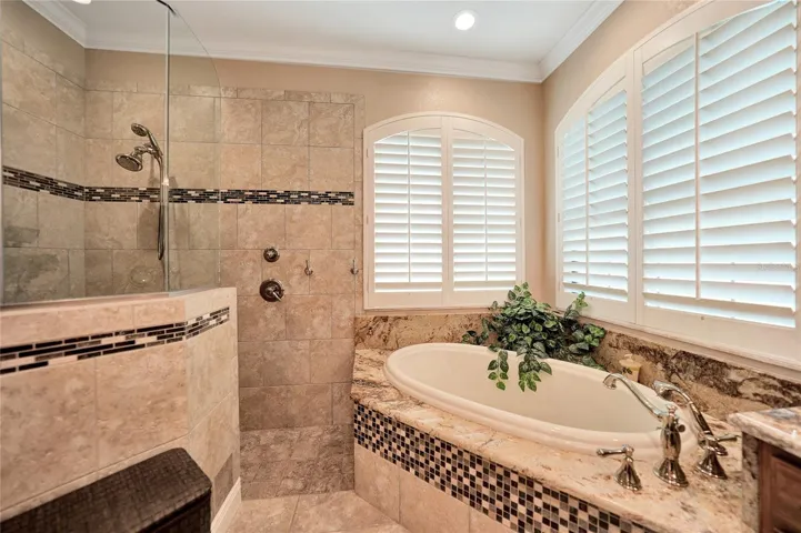 Lavish master bath, soaking tub, walk-in shower with double vanities