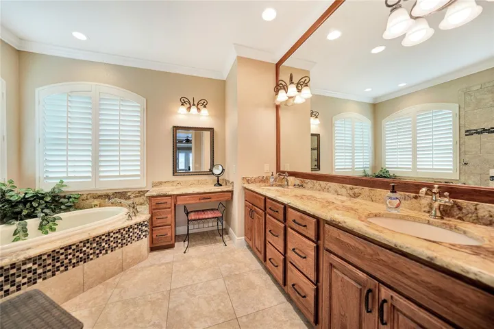 Beautiful tile work, granite tops and ladies dressing area