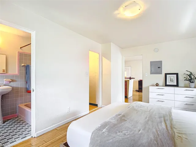 Bedroom, with a glimpse into the retro/vintage lavatory.