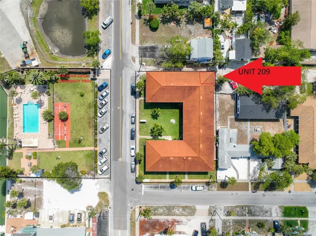 The heated community pool, along with the shuffle board courts & dock are across the street. Outlines are for reference only- NOT TO SCALE .