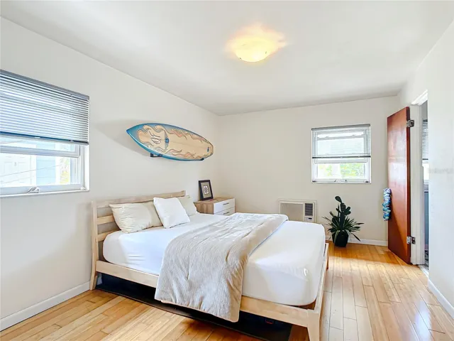 HUGE bedroom! Lots of natural light, AAAAMAAAAZING cross breezes!! Same bamboo flooring as living room & kitchenette. Door leads to the retro/vintage lavatory. Out of sight , but to your right, is a walk-in closet.