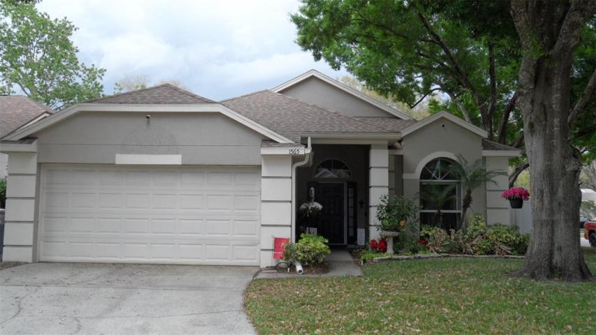 1565 Woodfield Oaks Dr - 1544 sq ft. - 3 bedrooms/2 bathrooms w/2 Car garage, screen enclosed patio