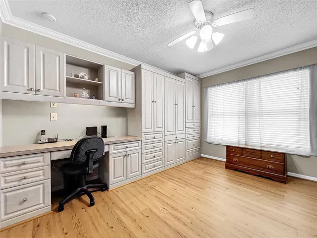 Custom cabinets with desk area and storage