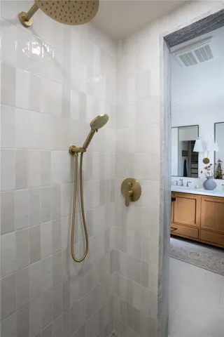Rain shower accompanied by a convenient hand-held shower head. Cloe tile is a stunning glazed ceramic wall tile that features a beautiful range of hues and tones.
