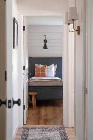 3rd bedroom offers Plantation Shutters and a remote-controlled fan.
