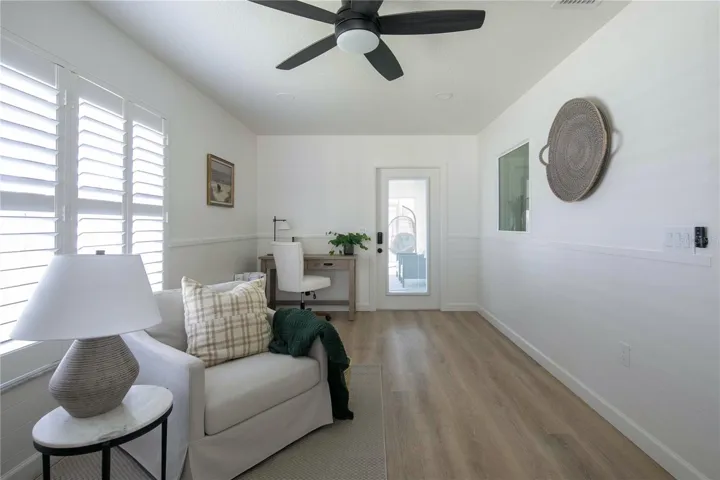 This space also provides direct access to the lanai through the hurricane impact glass door.