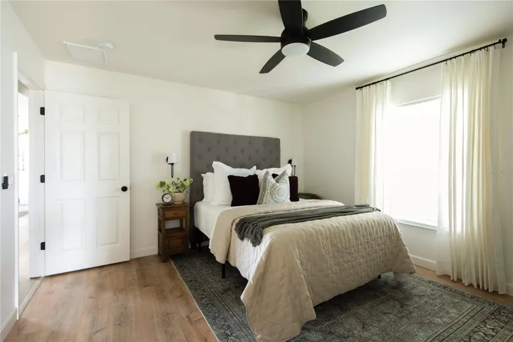 Master features: walk-in closet, wireless remote controlled sconces, remote controlled fan, faux wooden blinds.