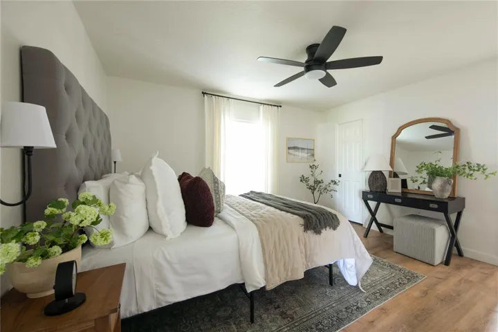 The primary bedroom is separate from the two other bedrooms.