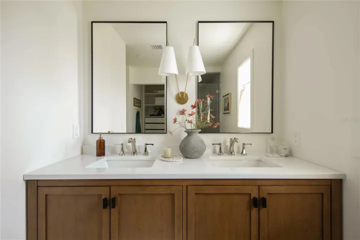Studio McGee, Milan Sconce, Pfister Arterra faucets in polished nickel, Allen & Roth double vanity