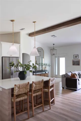 The kitchen island has nine drawers and a hidden electric drawer.