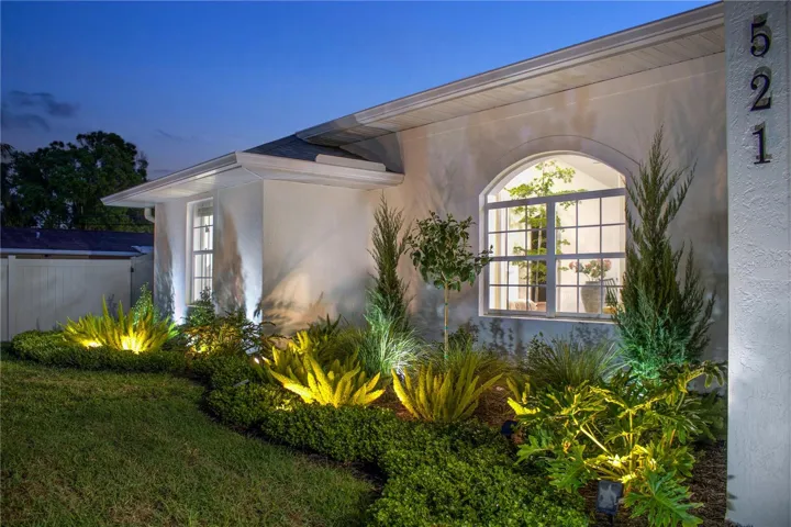 Curated landscaping with solar spot lights