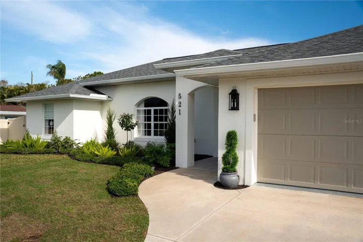 Grass will get greener once we enter the warmer months.  Potted exterior UV coated faux plants that never need a trimming!