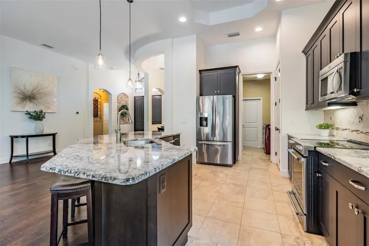 View of laundry area and garage access
