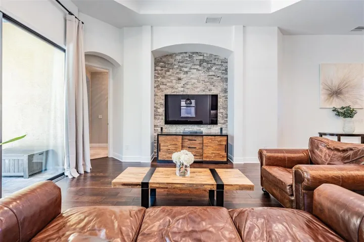 High end finishes throughout the home include arched doorways and millwork
