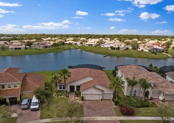 The lake life is calling! Beautiful move-in ready 3-bedroom + office, 2-full bath LAKEFRONT POOL HOME with must-see WATER VIEWS, fantastic RESORT STYLE AMENITIES and DIRECT ACCESS TO LAKE TOHO!