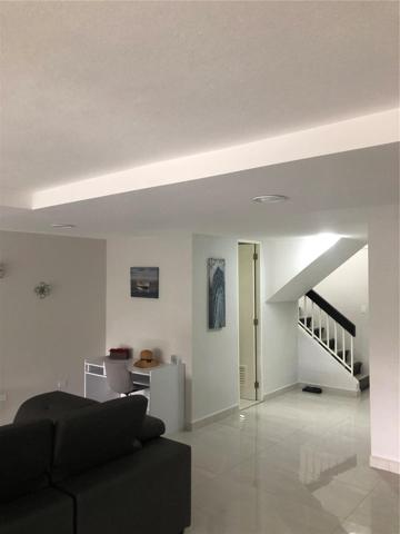 view from dining area to entry foyer