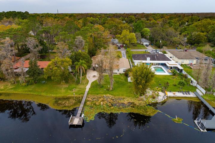 Home with a boat dock on a ski lake.