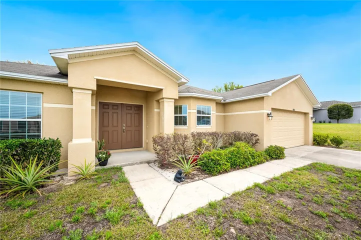 Front of home with double entry doors