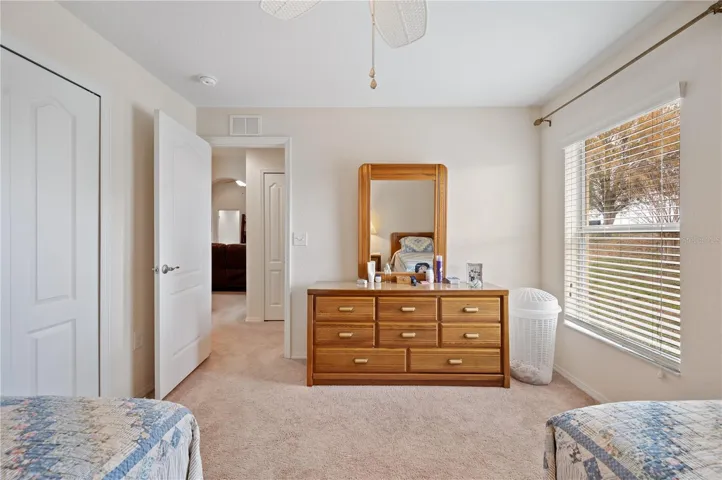 Bedroom #2 with closet looking to the hallway