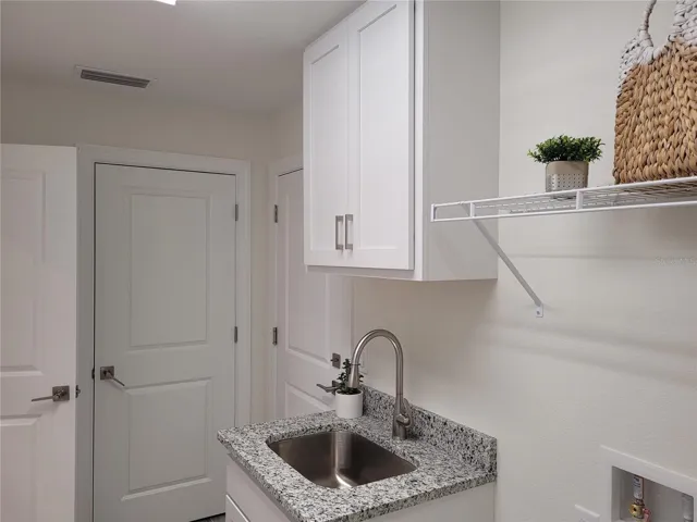 Photos are from a similar finished house